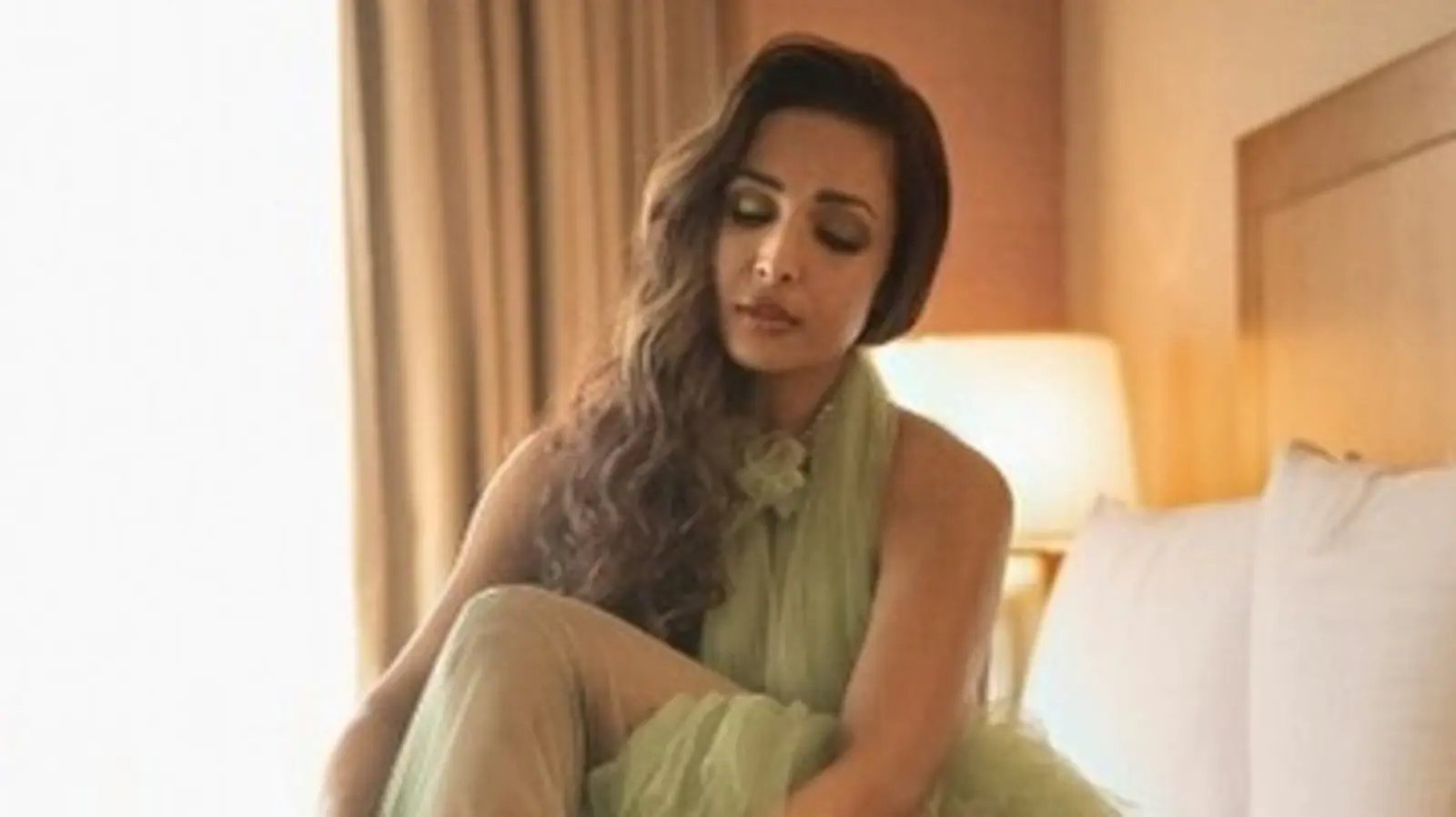 Malaika Arora in sheer ruffle dress and ₹83k gold heels gets captured in a candid moment: See pic