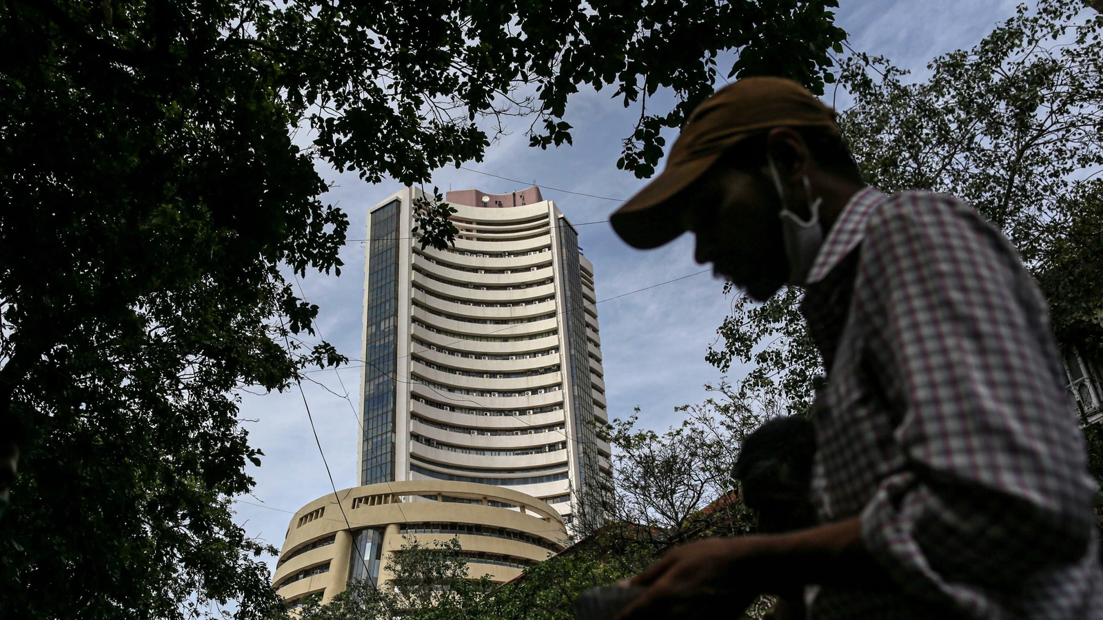 Day after election results, markets open in red; Sensex, Nifty down 414 and 124 points