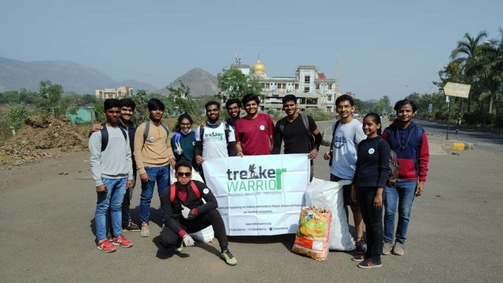 Trekkers pick up trash to keep their hillsides green