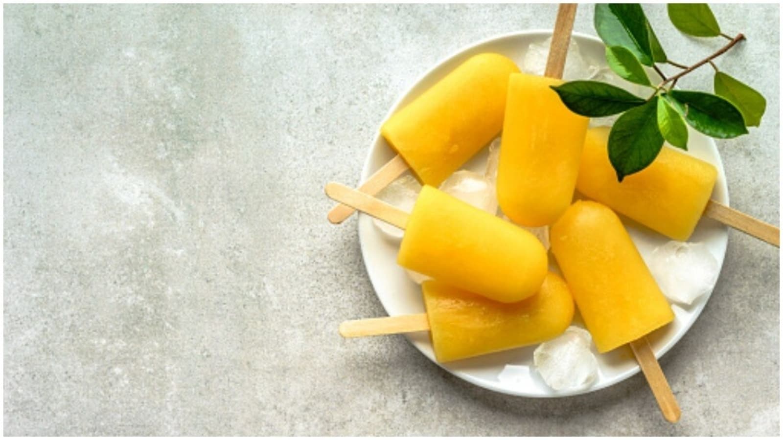 Relive your childhood with mango yoghurt popsicles. Recipe inside