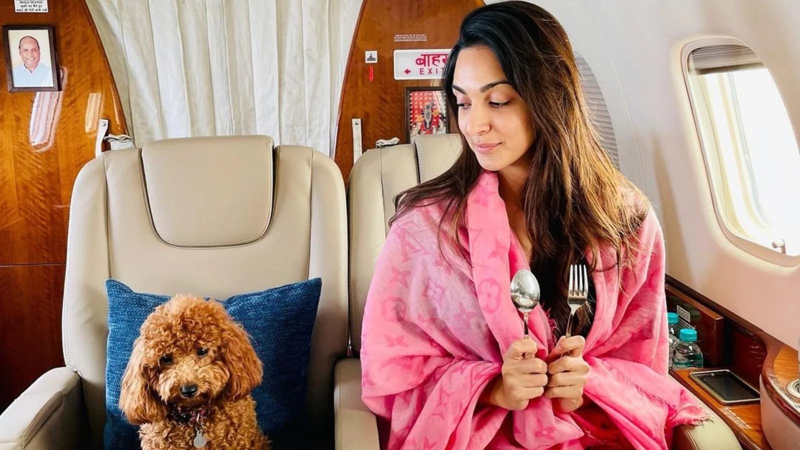 Kiara Advani posts pic with Ram Charan’s pet on a flight, Arjun Kapoor calls it ‘couple goals’
