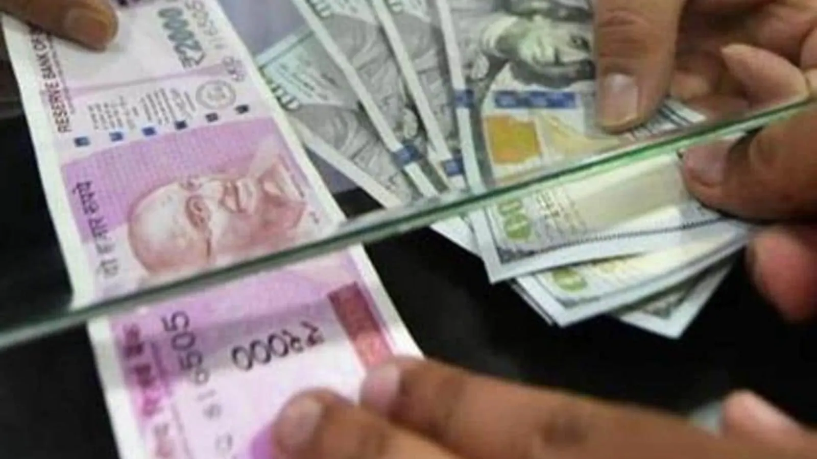 Rupee falls 16 paise to record low of 77.60 against US dollar