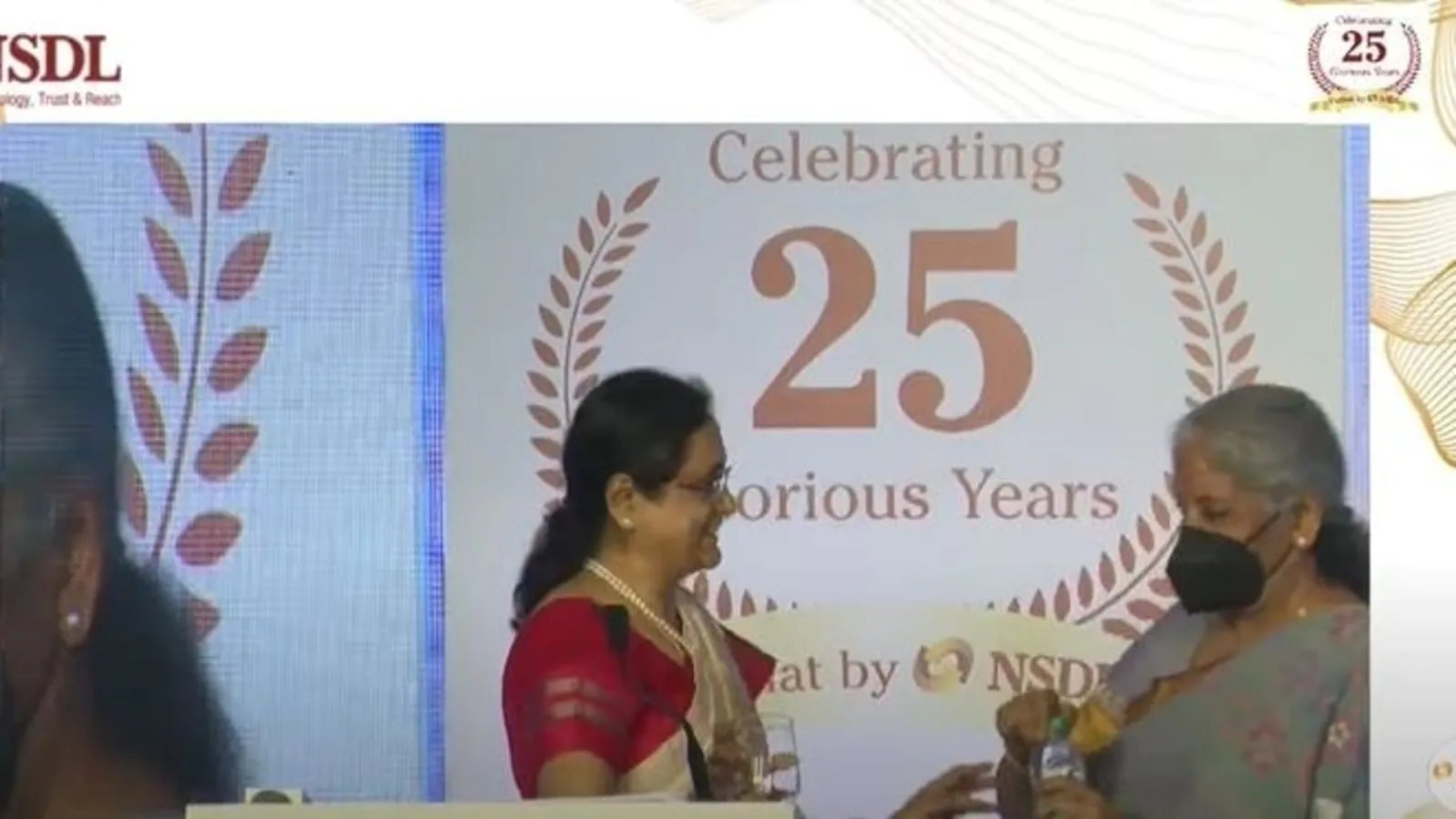 Watch: Nirmala Sitharaman gets up from her seat, offers water to NSDL MD
