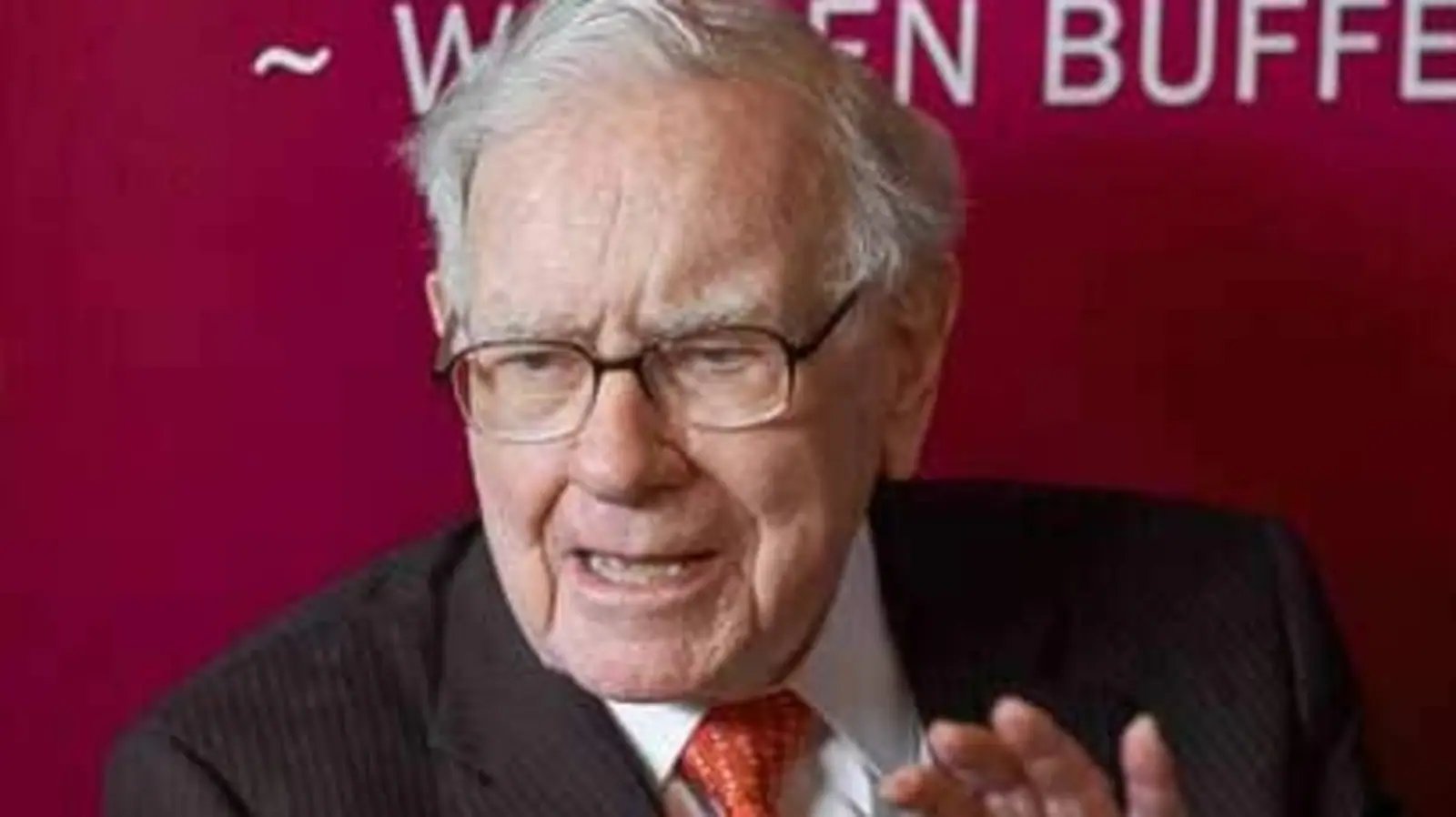 Berkshire Hathaway posts huge quarterly loss; operating results improve