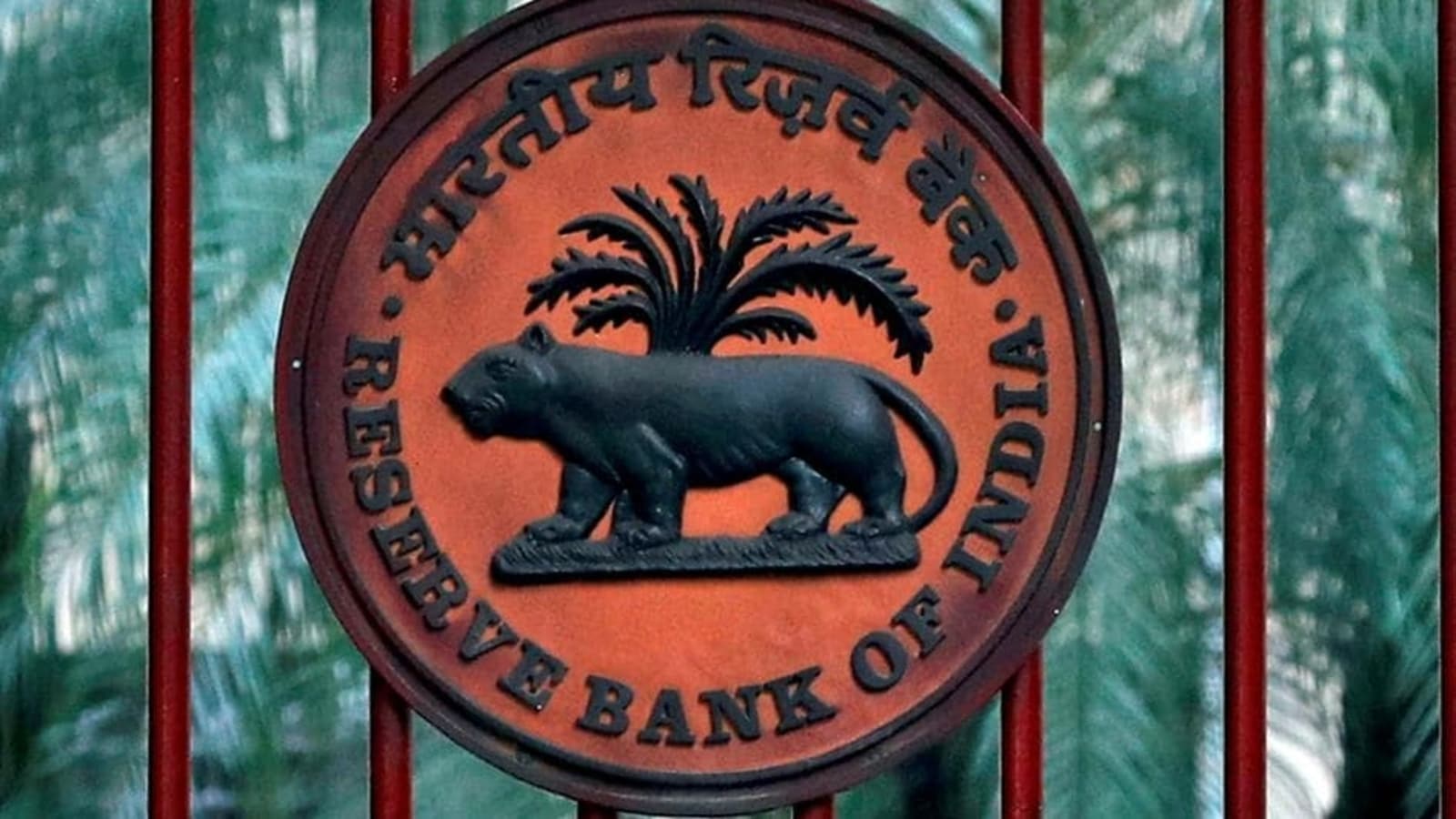 RBI hikes policy rate, cuts growth forecast